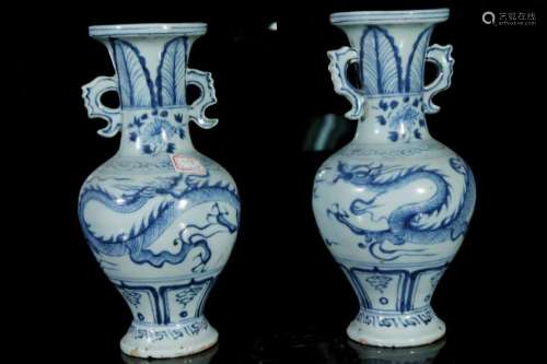 A pair of blue and white 'dragon' vases