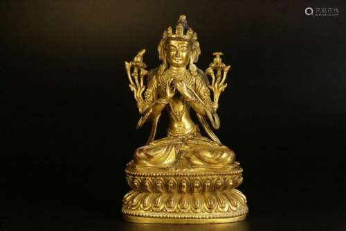 A gilt-bronze figure of manjusri