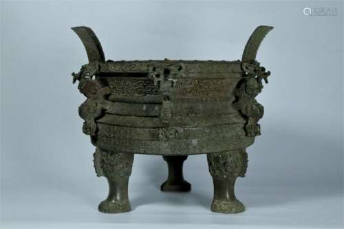 A bronze tripod