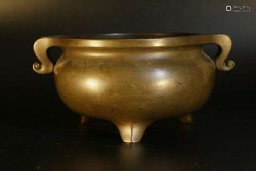 A bronze censer