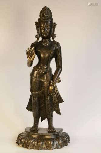 A bronze figure of guanyin