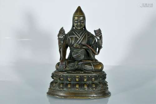 A stamp silver bronze figure of tsongkhapa