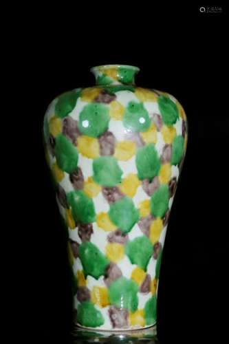 A plain tricolour vase