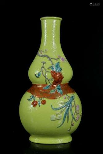 A yellow-glazed gourd-shaped vase