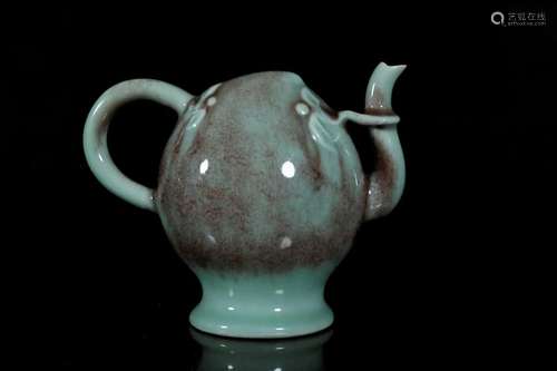 A flambe-glazed teapot