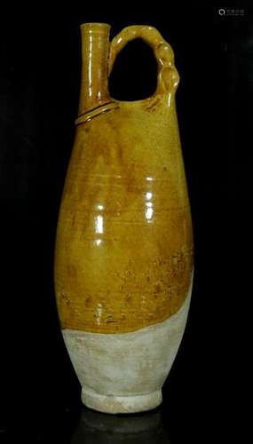 A yellow glaze ceramics jug