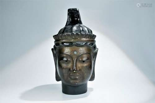 A black lacquer with gold Buddha's head