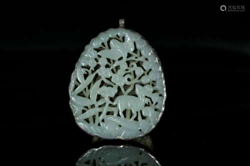 A white jade pendant