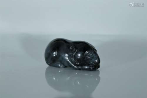 A dark jade bear