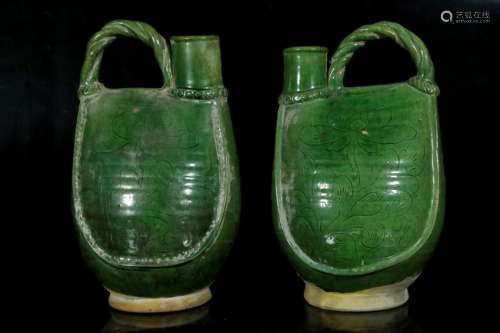 A green glaze ceramics jug