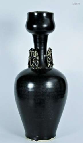 A black glaze vase