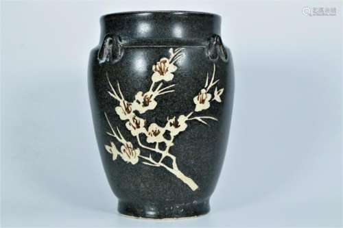 A black glaze vase