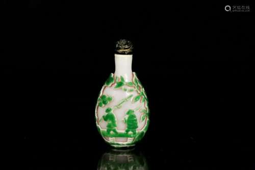 A green overlay white glass snuff bottle