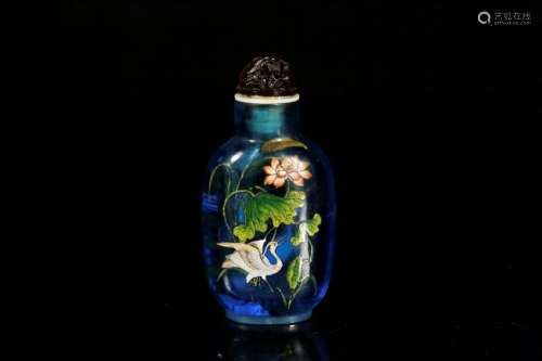 An enamelled blue glass snuff bottle