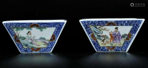 A pair of blue and white square cups