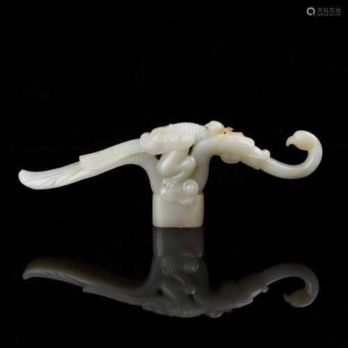 A Chinese Carved Jade Stick Top