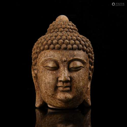 A Chinese Carved Stone Buddha Head