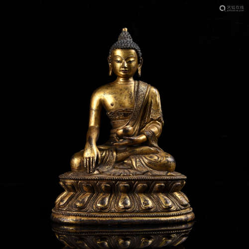 A Chinese Gilt Bronze Figure of Buddha