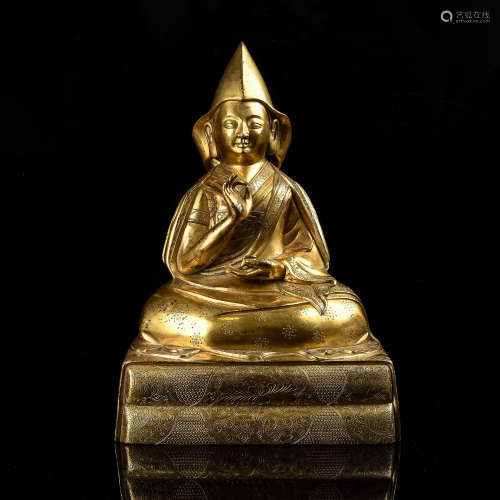 A Chinese Gilt Bronze Figure of Buddha