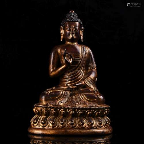 A Chinese Gilt Bronze Figure of Buddha