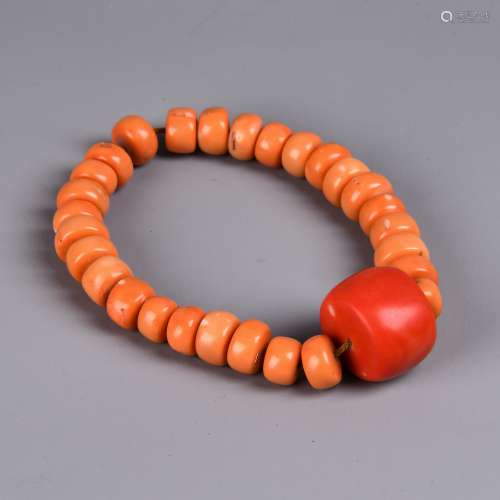 A Chinese Carved Coral Bracelet