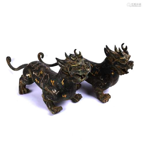 A Pair of Chinese Bronze Foo-Dogs