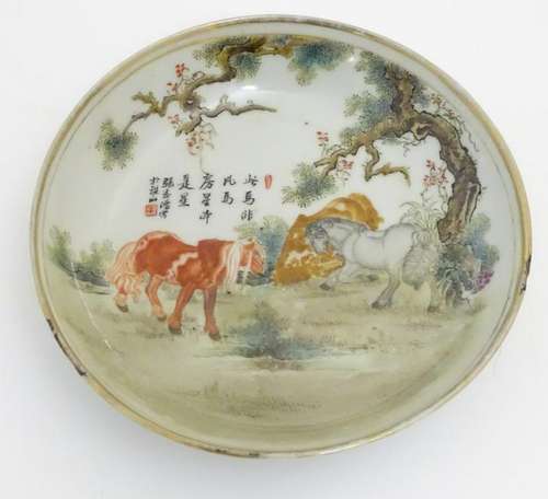 A small Chinese famille rose dish, decorated with three