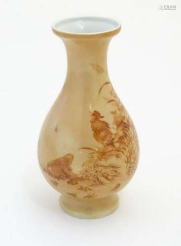 A Chinese baluster vase with a buff coloured ground