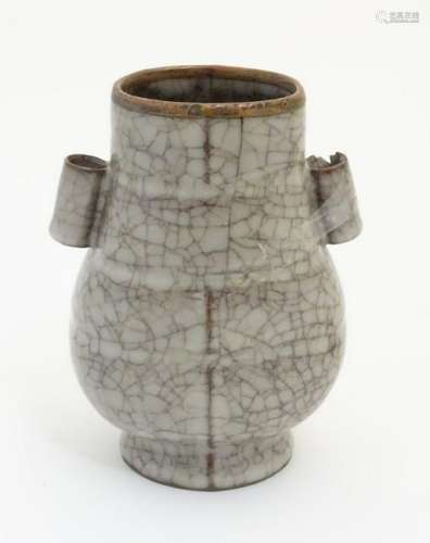 A Chinese Ge vase with a crackle glaze, twin tubular