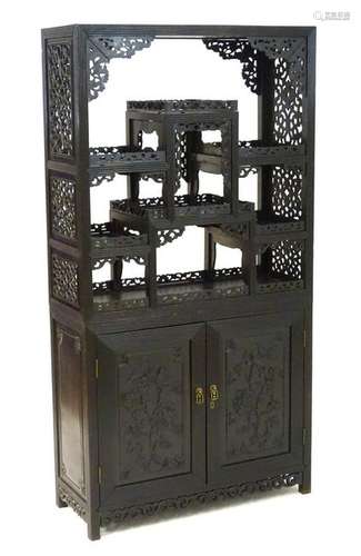 A late 19thC / early 20thC Chinese hardwood cabinet