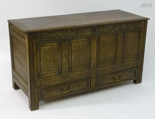 An early 18thC oak coffer / mule chest with a