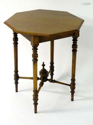 A late 19thC / early 20thC walnut occasional table,