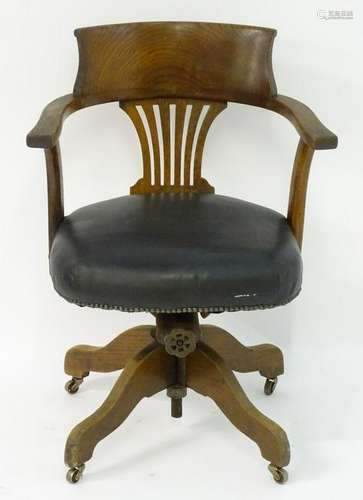 A late 19thC / early 20thC oak adjustable captains