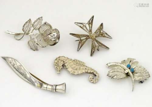 Assorted brooches including one formed as a seahorse,