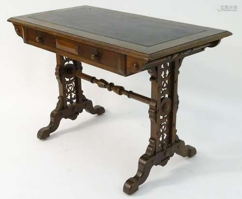 A mid / late 19thC oak library table with a rectangular