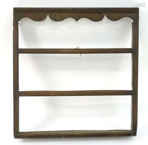 A late 18thC / early 19thC oak plate rack with a