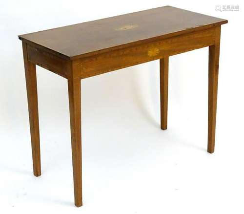 An early 19thC mahogany side table with satinwood cross