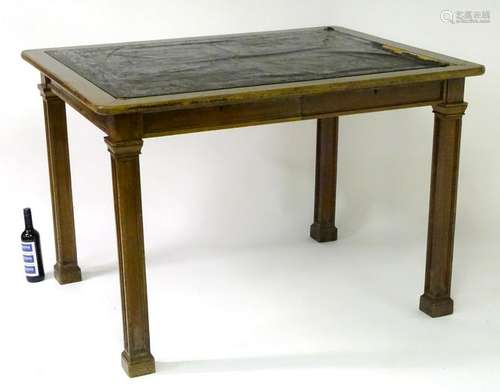 An early 20thC mahogany writing / architects table with