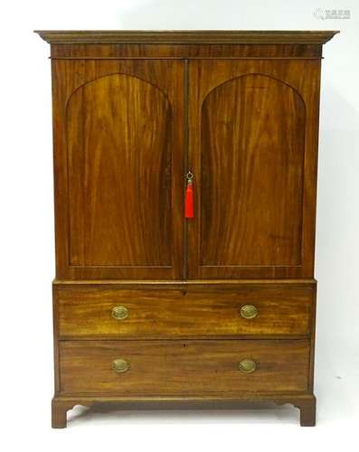 A 19thC and later mahogany linen press converted into a