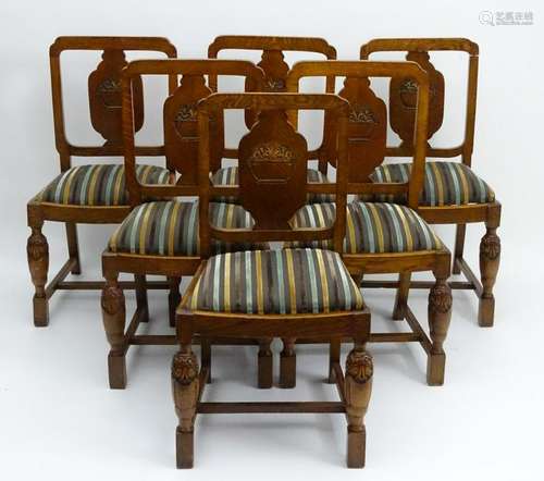 A set of six early / mid 20thC oak dining chairs, with