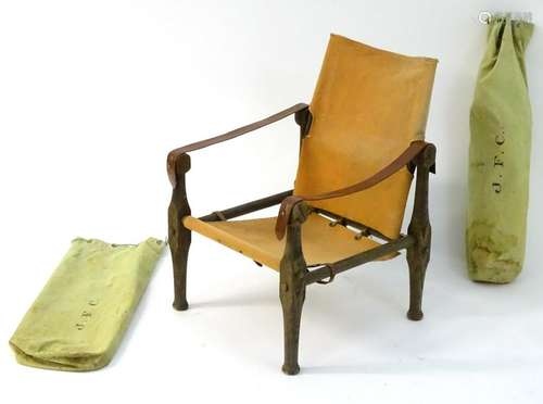 A pair of vintage campaign / safari chairs with