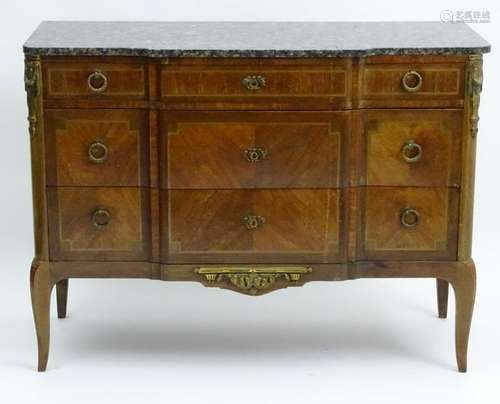 An early 20thC mahogany marble topped commode, having