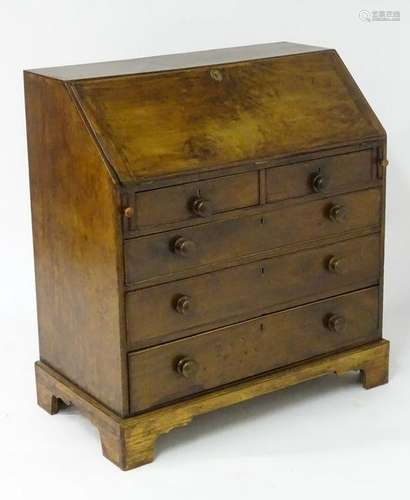 A late 18thC mahogany bureau with a fall front above