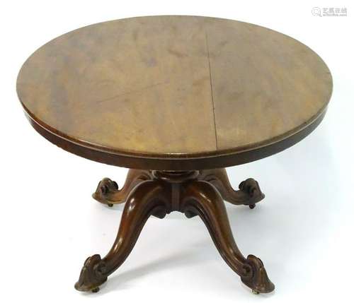 A late 19thC mahogany tilt top table, having an oval