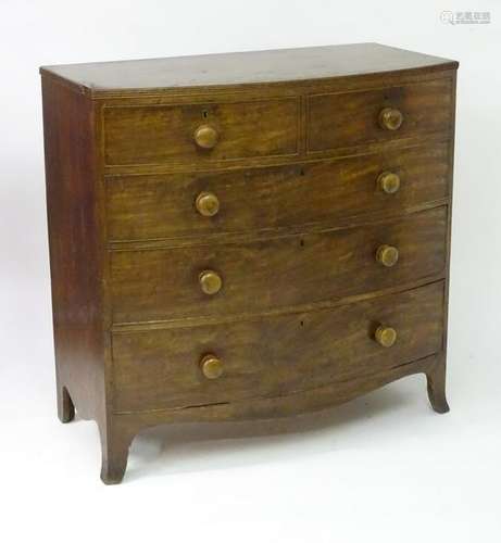 A mid 19thC mahogany bow fronted chest of drawers with