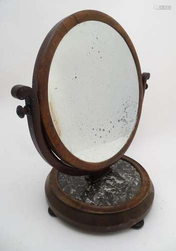 A mid / late 19thC mahogany toilet mirror, with a