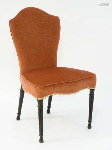 A late 18thC mahogany Hepplewhite model armchair with a