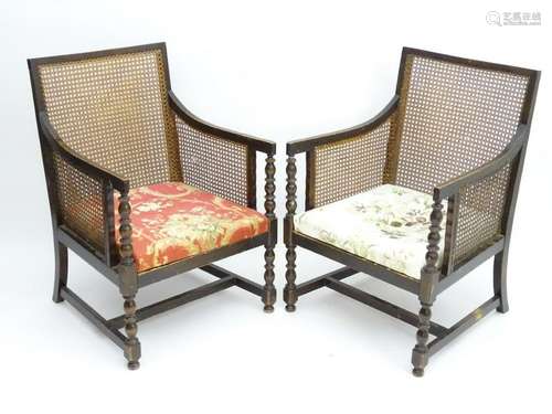 A pair of early / mid 20thC bergere armchairs with