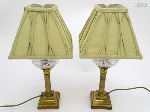 Table lamps: a pair of converted oil peg lamps having