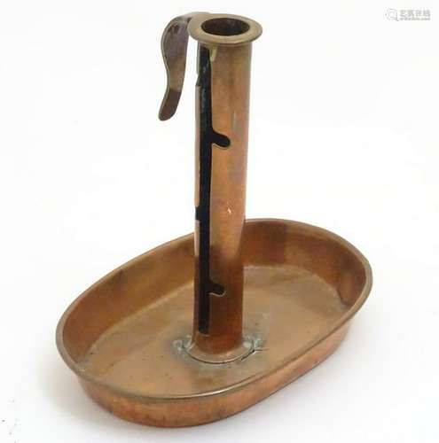 Chamber Stick:  a copper candlestick with oval drip